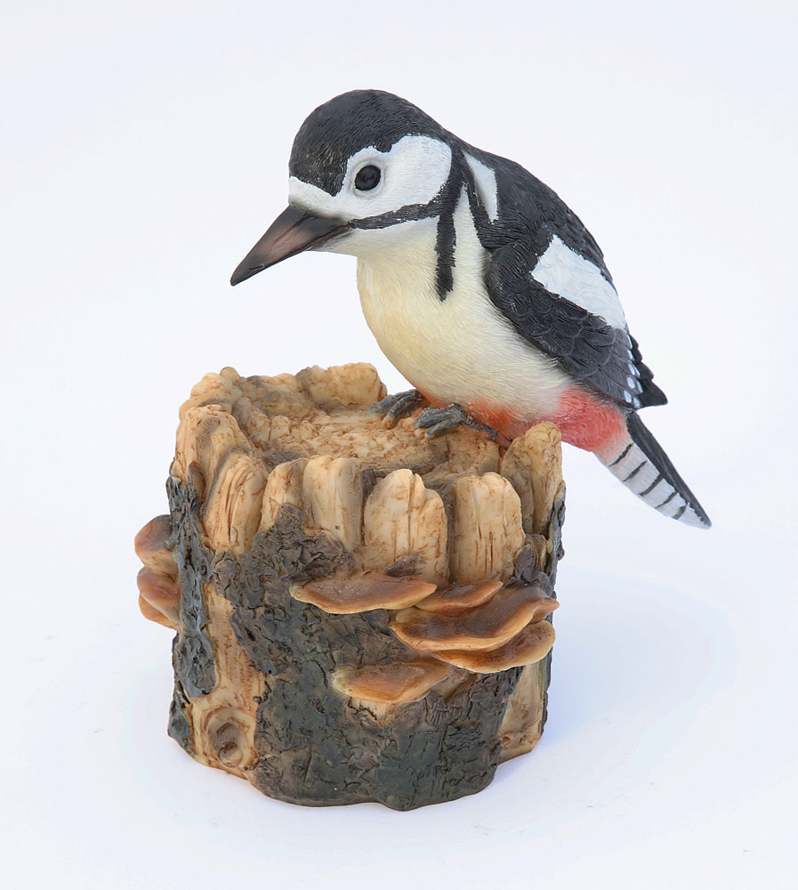 Woodpecker perched on a log - Garden Ornament